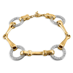 The Kelly Herd Snaffle Bit Bracelet is impeccably designed. You can even see the tiny stitches on the "leather" that connects the bits. Made of 14k yellow gold with white gold and pavé diamonds, or all white gold with diamonds.  Features      Snaffle bit bracelet     Enhanced with diamonds     Detailed check pieces connecting the bits together     Available in white/yellow gold combination, or all white gold     17mm x 7 1/4''