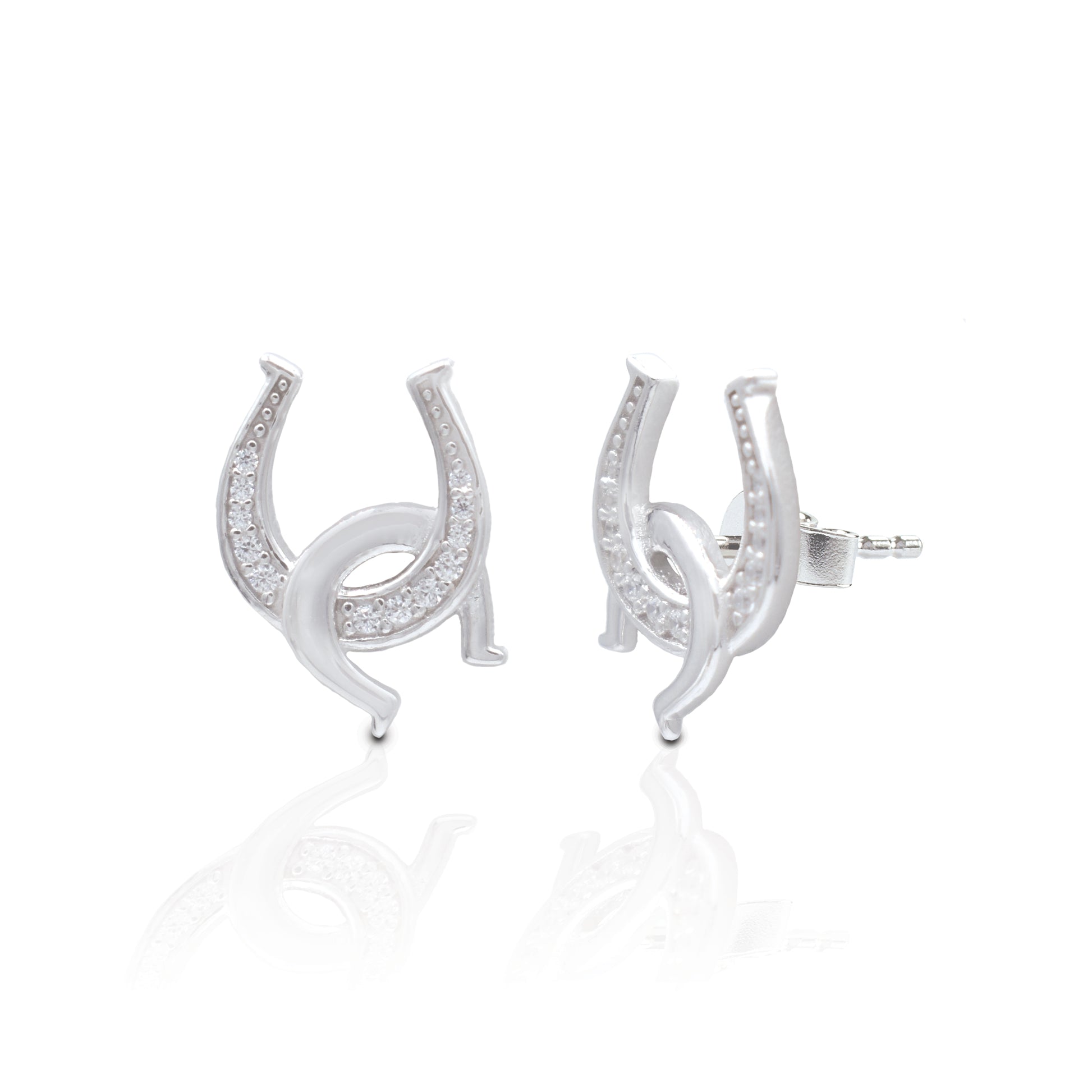 Double the luck and no matter how you wear them your luck will never run out! The Kelly Herd Clear Double Horseshoe Earrings have one upright horseshoe enhanced with clear cubic zirconia stones and an interlocking smooth one casually hooked through. They are the perfect compliment to our Kelly Herd Clear Double Horseshoe Necklace.   Features      Interlocking Horseshoe Design     Enhanced with Clear Cubic Zirconia Stones     Measures 12mm high and 7mm wide     Post Back     Sterling Silver