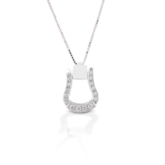 Cowgirl up with the Kelly Herd Oxbow Stirrup Necklace! This necklace features a Western oxbow stirrup shaped pendant fully enhanced with clear cubic zirconia. Made of sterling silver, it comes with an adjustable 16-18" chain.  Features      Western oxbow stirrup pendant     Clear CZ stones     Sterling Silver     Adjustable 16-18" chain     14mm x 18mm