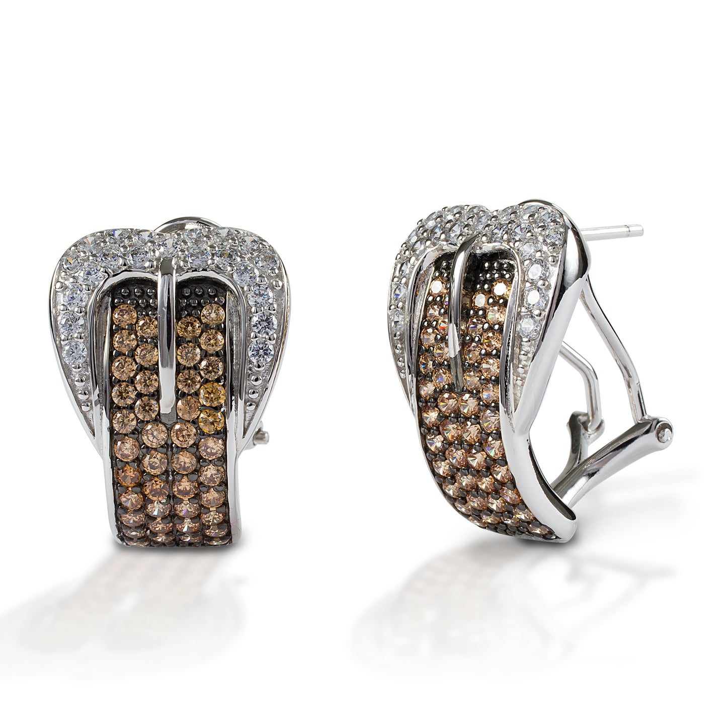The Kelly Herd Cognac Buckle Earrings feature a classic Western buckle in clear diamonds with a "belt" of gorgeous Cognac diamonds. Available in your choice of white or yellow gold. French clip with post back.  Features      Western buckle earrings     Clear and Cognac diamonds     Available in white, or yellow 14k gold     French clip post backs     17mm x 26mm