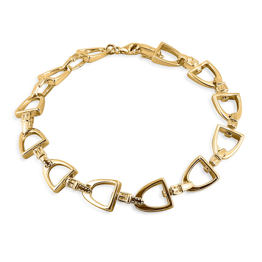 In the tradition of European fashion houses, the Kelly Herd Stirrup Bracelets utilizes English stirrups as a fashion motif. Available in your choice of white or yellow gold.  Features      English stirrup bracelet     Available in white, or yellow 14k gold     9mm x 7 1/4''
