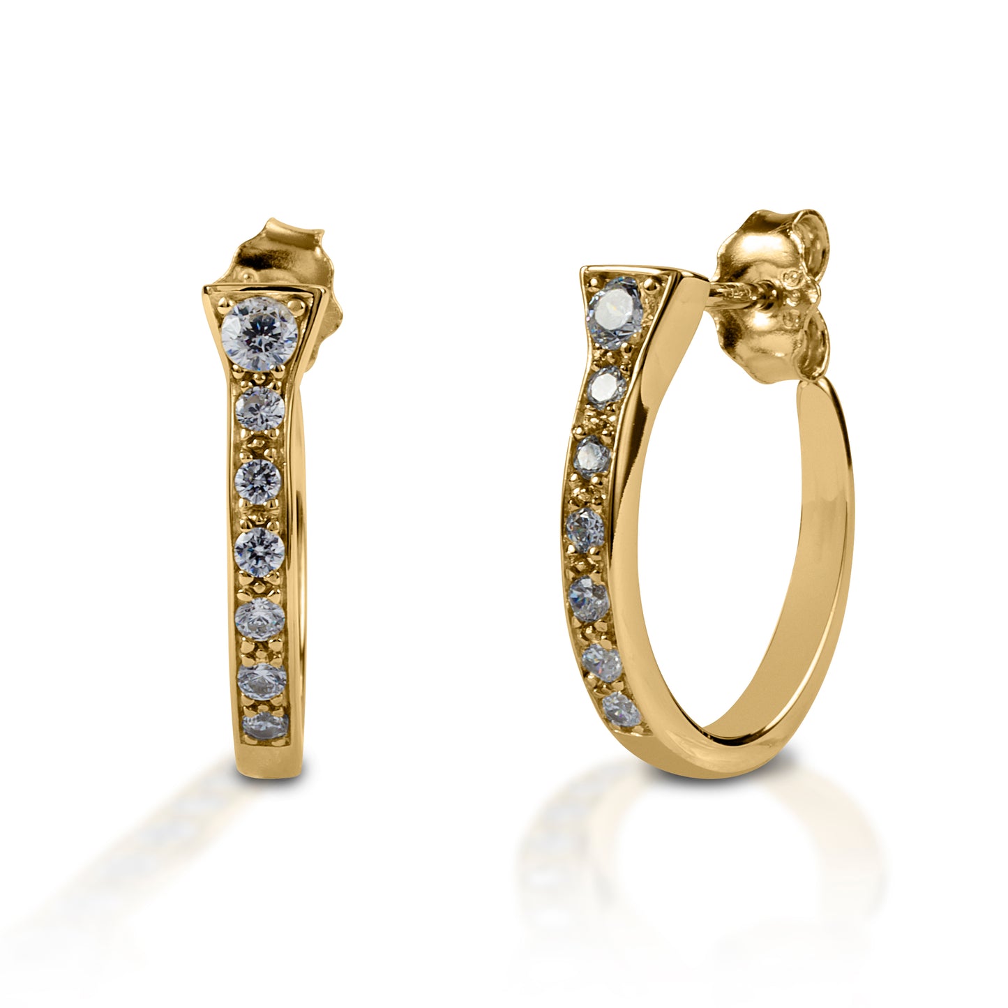 Kelly Herd Horseshoe Nail Earrings offer a classic hoop earring style, with an equestrian nod. Made of white or yellow gold horseshoe "nails" enhanced with diamonds these earrings will complement almost any fashion style. Post back.  Features      Horseshoe nails curved into a hoop style     Diamonds     Available in white, or yellow 14k gold     Hoop with post back     5mm x 19mm