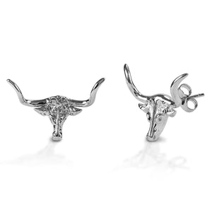 Sleek and shiny, the Kelly Herd Small Long Horn Earrings feature a long horn head in your choice of smooth white or yellow gold. Post backs.  Features      Long horn head earrings     Available in white, or yellow 14k gold     Smooth shiny surface     Post backs