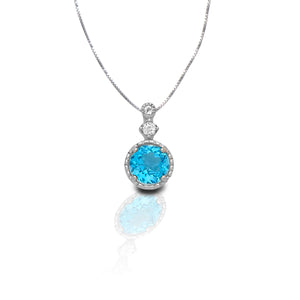 Elevate your everyday look with this gleaming blue topaz necklace. With inspiration taken from the glimmering blue seas, you'll feel like you're on island time and get swept away by the beauty of this blue stunner. Comes with a 16"-18" adjustable box chain.