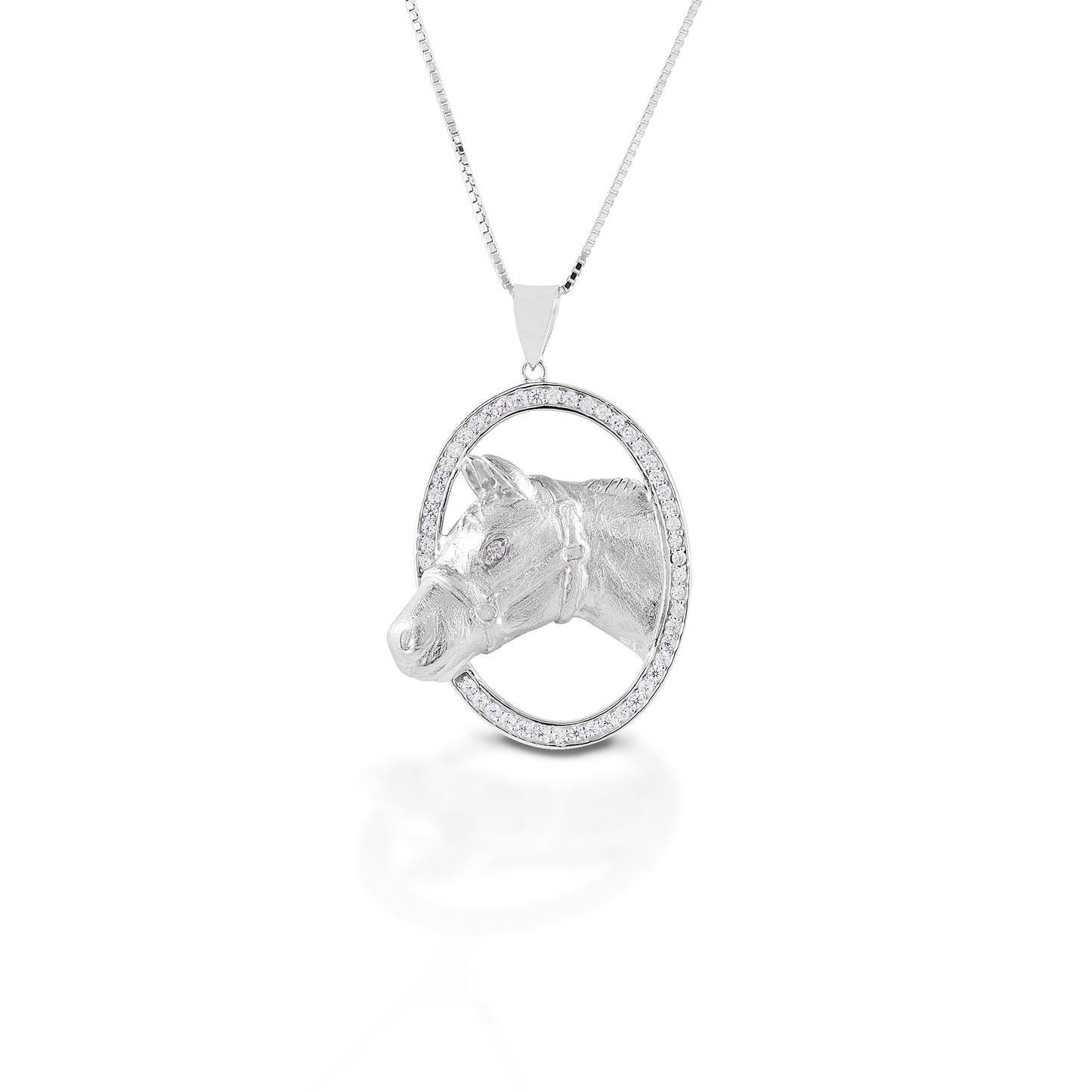 If you are a stock horse aficionado, then the Kelly Herd Circle Halter Horse is for you! This beautifully rendered pendant features a silhouette of a halter horse in an oval frame of cubic zirconia. Sterling Silver Adjustable 16-18" chain.  Features      Stock horse pendant     Accented with clear CZ stones     Sterling Silver     Adjustable 16-18" chain     35mm x 27mm