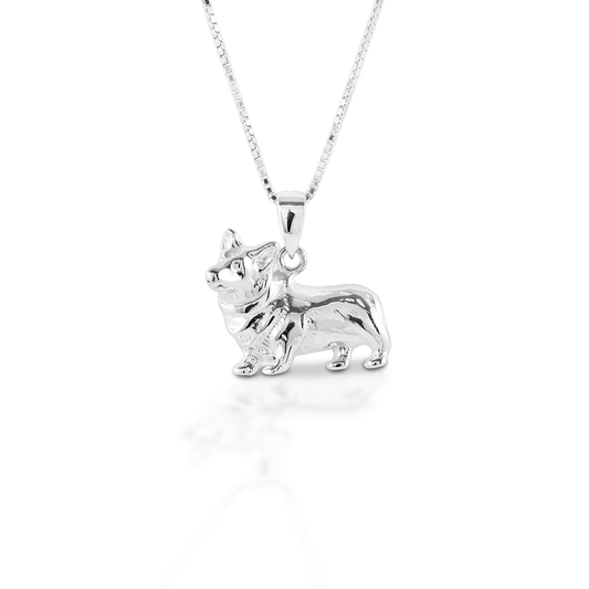 You can't help but love a Corgi! Kelly Herd's Corgi pendant is beautifully rendered in sterling silver. You can even see the fluffy hair! Comes with 16-18" adjustable chain.  Features      Corgi pendant     Sterling Silver     Comes with adjustable 16-18" chain     18 mm x 14 mm   