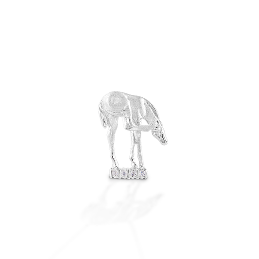 Impossibly long legs and endless curiosity - Kelly Herd's Scratching Foal Pendant captures the look and spirit of equine babies. Crafted in 14K gold, and enhanced with diamonds.  Features      Foal pendant     Enhanced with diamonds     Available in 14K gold     18mm x 24mm