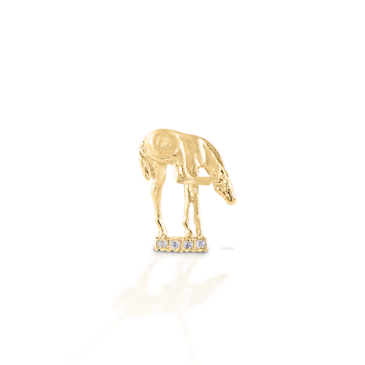 Impossibly long legs and endless curiosity - Kelly Herd's Scratching Foal Pendant captures the look and spirit of equine babies. Crafted in 14K gold, and enhanced with diamonds.  Features      Foal pendant     Enhanced with diamonds     Available in 14K gold     18mm x 24mm