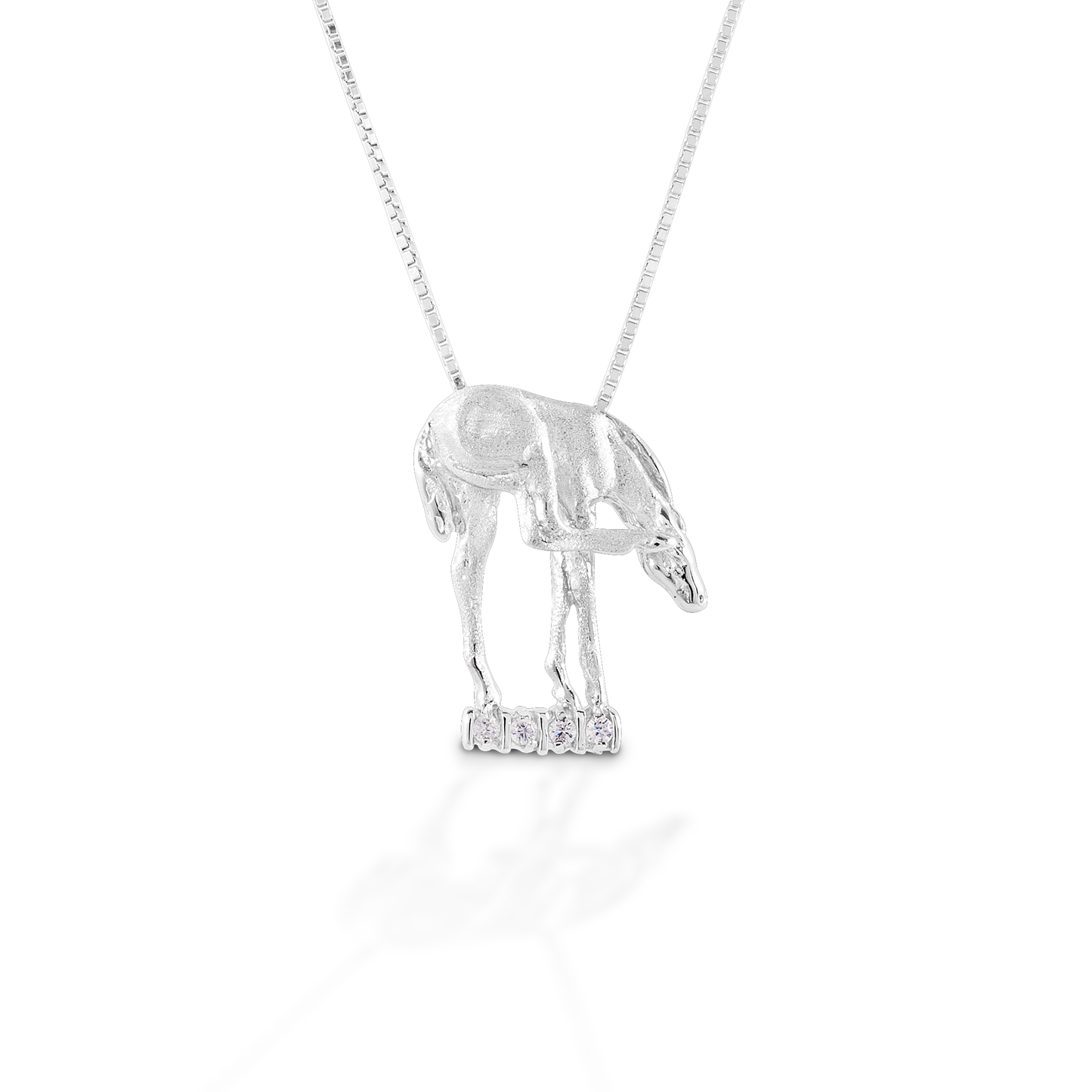 Impossibly long legs and endless curiosity - Kelly Herd's Scratching Foal Pendant captures the look and spirit of equine babies. Crafted in sterling silver, and enhanced with clear CZ stones. Comes with 16-18" adjustable chain.  Features      Foal pendant     Enhanced with clear CZ stones     Sterling Silver     Comes with adjustable 16-18" chain     18mm x 24mm