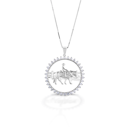 Kelly Herd's Ranch Horse Pendant captures the quieter moments of ranch and farm live. Crafted in sterling silver, and enhanced with CZ stones. Comes with 16-18" adjustable chain.  Features      Ranch horse pendant     Clear CZ stones     Sterling Silver     28mm x 6mm