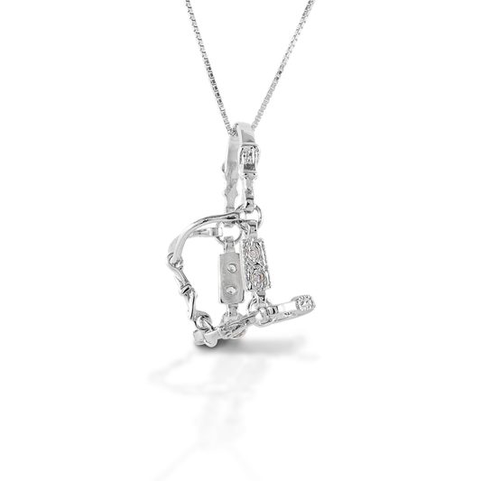 Carry your horse near your heart with the Kelly Herd Small Halter Necklace. This perfectly crafted tiny three dimensional halter is made of sterling silver with CZ stones on the cheek pieces and nose band. Comes with a 16"-18" adjustable chain.  Features      Three-dimensional halter pendant     Clear cubic zirconia stones     Sterling Silver     Comes with adjustable 16-18" chain     27 mm x 29 mm
