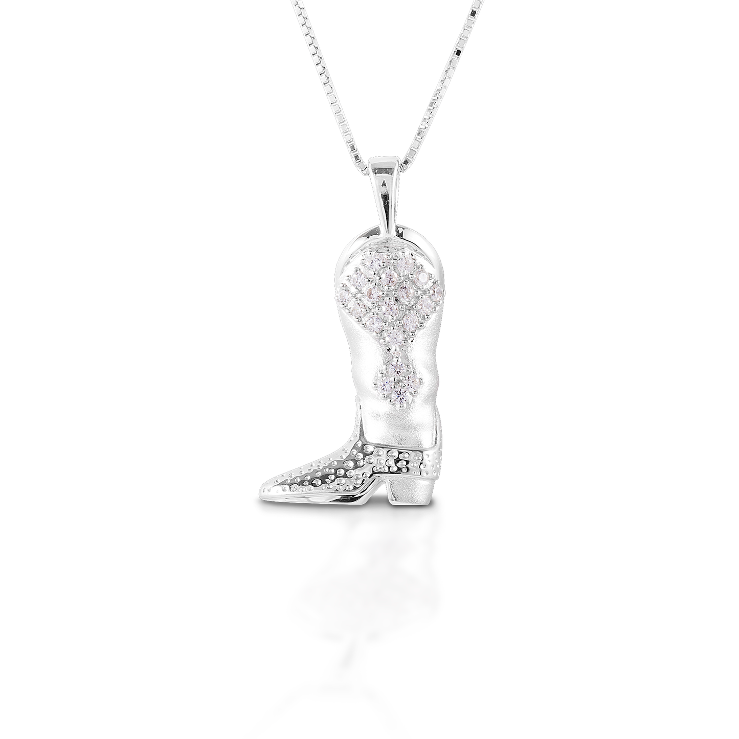 Cowboy boots are always appropriate! Especially when they are made in sterling silver. The Kelly Herd Western Boot Necklace features a beautifully rendered cowboy boot enhanced with a CZ stone pattern. Comes with 16-18" adjustable chain.  Features      Western boot pendant     Clear CZ stones     Sterling Silver     Comes with adjustable 16-18" chain