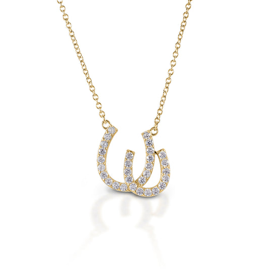 Have double the luck with the Kelly Herd Double Horseshoe Necklace. This gold and diamond pendant features two overlapping horseshoes. Available in 14K gold with various grades of diamonds.  Features      Double Horseshoe pendant     Available in 14K gold     Diamonds     10 mm x 18 mm