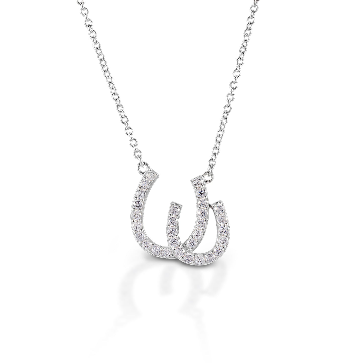 Have double the luck with the Kelly Herd Double Horseshoe Necklace. This sterling silver and CZ pendant features two overlapping horseshoes enhanced with CZ. Comes with a 16"-18" adjustable chain.  Features      Double Horseshoe pendant     Sterling Silver     Clear cubic zirconia stones     15 mm x13 mm