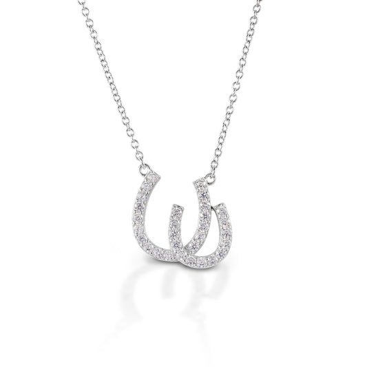 Have double the luck with the Kelly Herd Double Horseshoe Necklace. This gold and diamond pendant features two overlapping horseshoes. Available in 14K gold with various grades of diamonds.  Features      Double Horseshoe pendant     Available in 14K gold     Diamonds     10 mm x 18 m