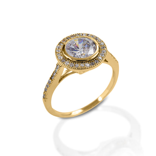 The Kelly Herd Bezel Set Pavé Ring is a classic vintage style. This ring features round bezel set pavé diamonds in a white or yellow gold setting. Matching earrings and necklace are also available.  Features      Round bezel set ring     Available in white, or yellow 14k gold     Diamonds     12mm x 8mm