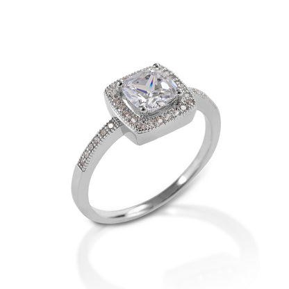 The Kelly Herd Bezel Set Pavé Ring is a classic vintage style. This ring features square bezel set pavé CZ in a sterling silver setting. Matching earrings and necklace are also available.  Features:      Square bezel set ring     Sterling Silver     Enhanced with clear cubic zirconia     10mm x 10mm