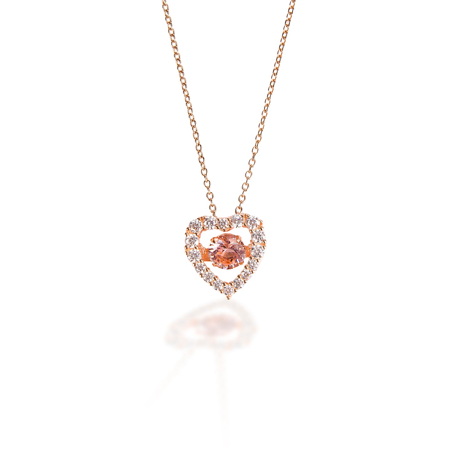 A perfect rose and pink heart! The Kelly Herd Clear & Pink Heart Pendant is made of rose gold plate with a pink cubic zirconia stone in the middle and clear pave cubic zirconia on the heart. The result is a beautiful subtle pink tone. Comes complete with adjustable chain. 