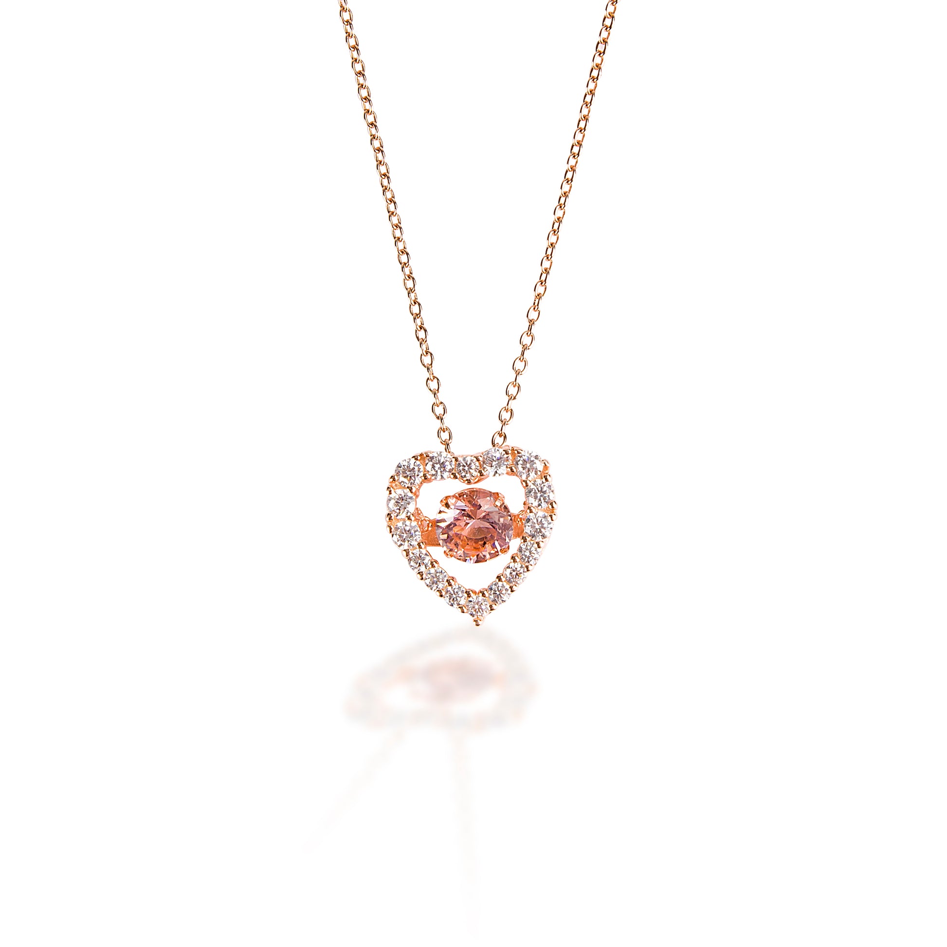A perfect rose and pink heart! The Kelly Herd Clear & Pink Heart Pendant is made of rose gold plate with a pink cubic zirconia stone in the middle and clear pave cubic zirconia on the heart. The result is a beautiful subtle pink tone. Comes complete with adjustable chain. 