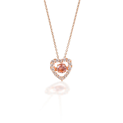 A perfect rose and pink heart! The Kelly Herd Clear & Pink Heart Pendant is made of rose gold plate with a pink cubic zirconia stone in the middle and clear pave cubic zirconia on the heart. The result is a beautiful subtle pink tone. Comes complete with adjustable chain. 