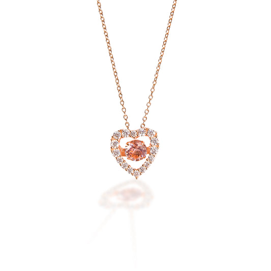 A perfect rose and pink heart! The Kelly Herd Clear & Pink Heart Pendant is made of rose gold plate with a pink cubic zirconia stone in the middle and clear pave cubic zirconia on the heart. The result is a beautiful subtle pink tone. Comes complete with adjustable chain. 